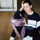 LA BANANE TCHIKITA EN CUIR METALLISE ROSE